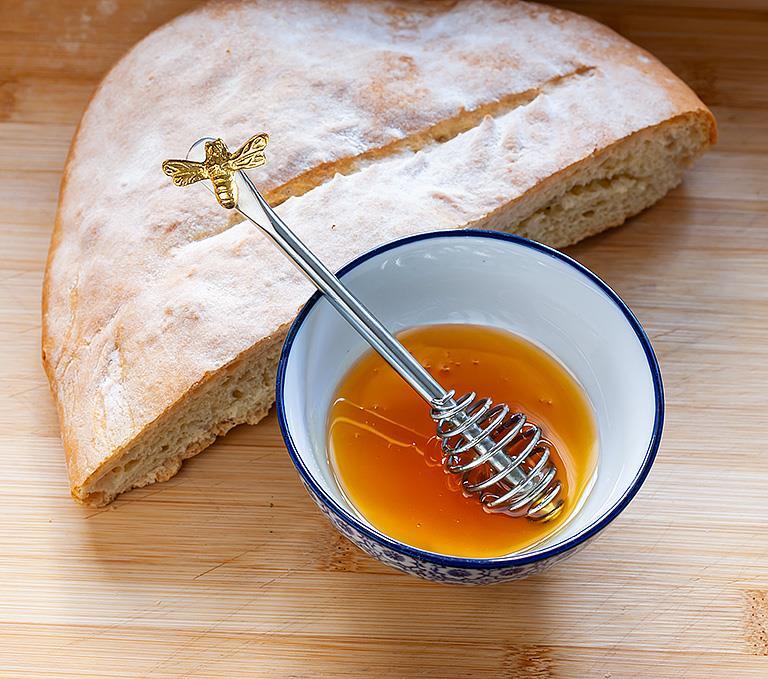 Barbouilleur de miel d'abeille