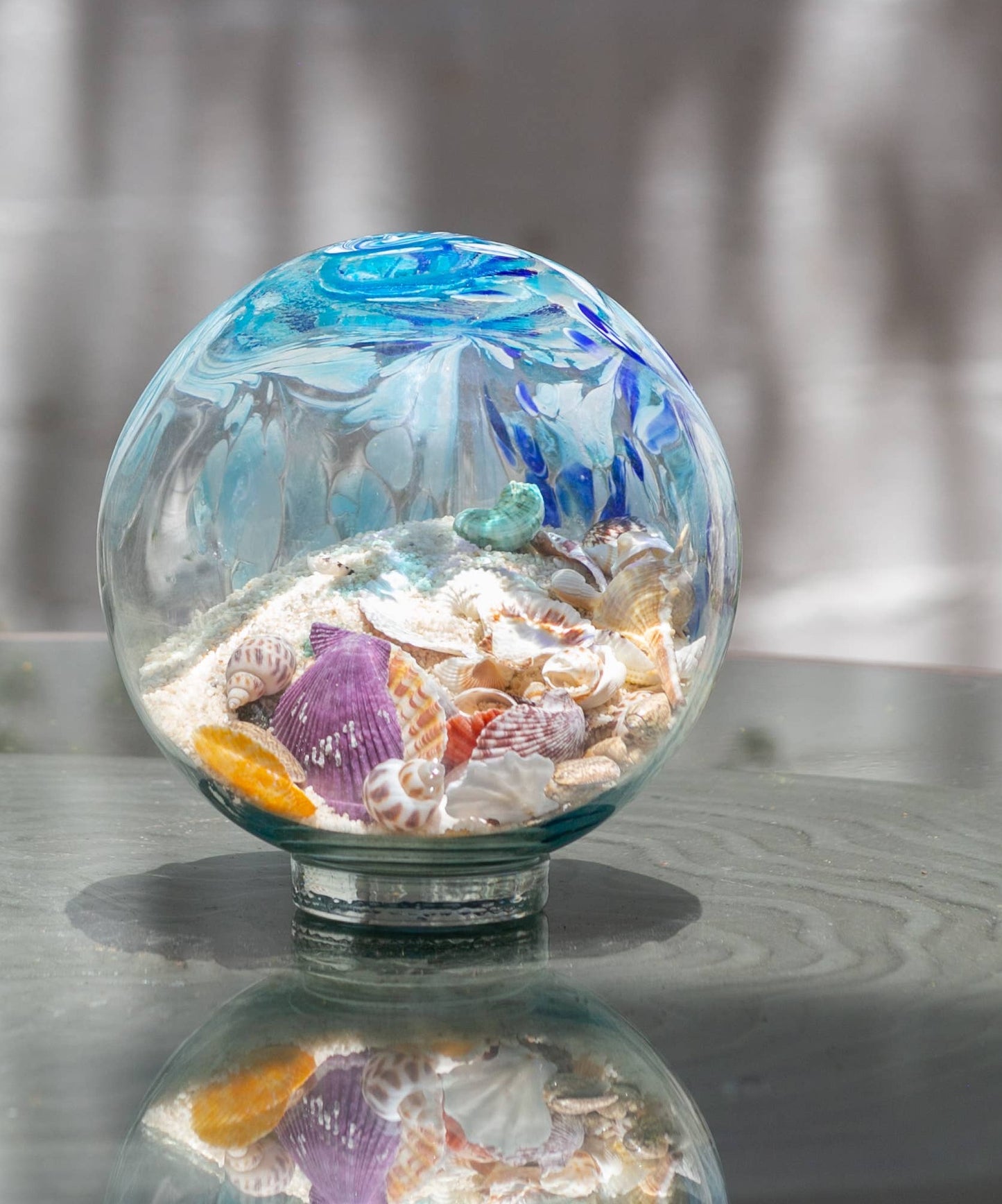 Globe marin en verre d'art assorti de 7 po